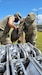 Culinary Specialists assigned to Headquarters and Headquarters Company, 311th Signal Command (Theater) set up a Mobile Kitchen Trailer and prepare to serve a meal to their fellow Army Reserve Soldiers in the field during range qualification operations at Schofield Barracks, Apr. 9, 2021.