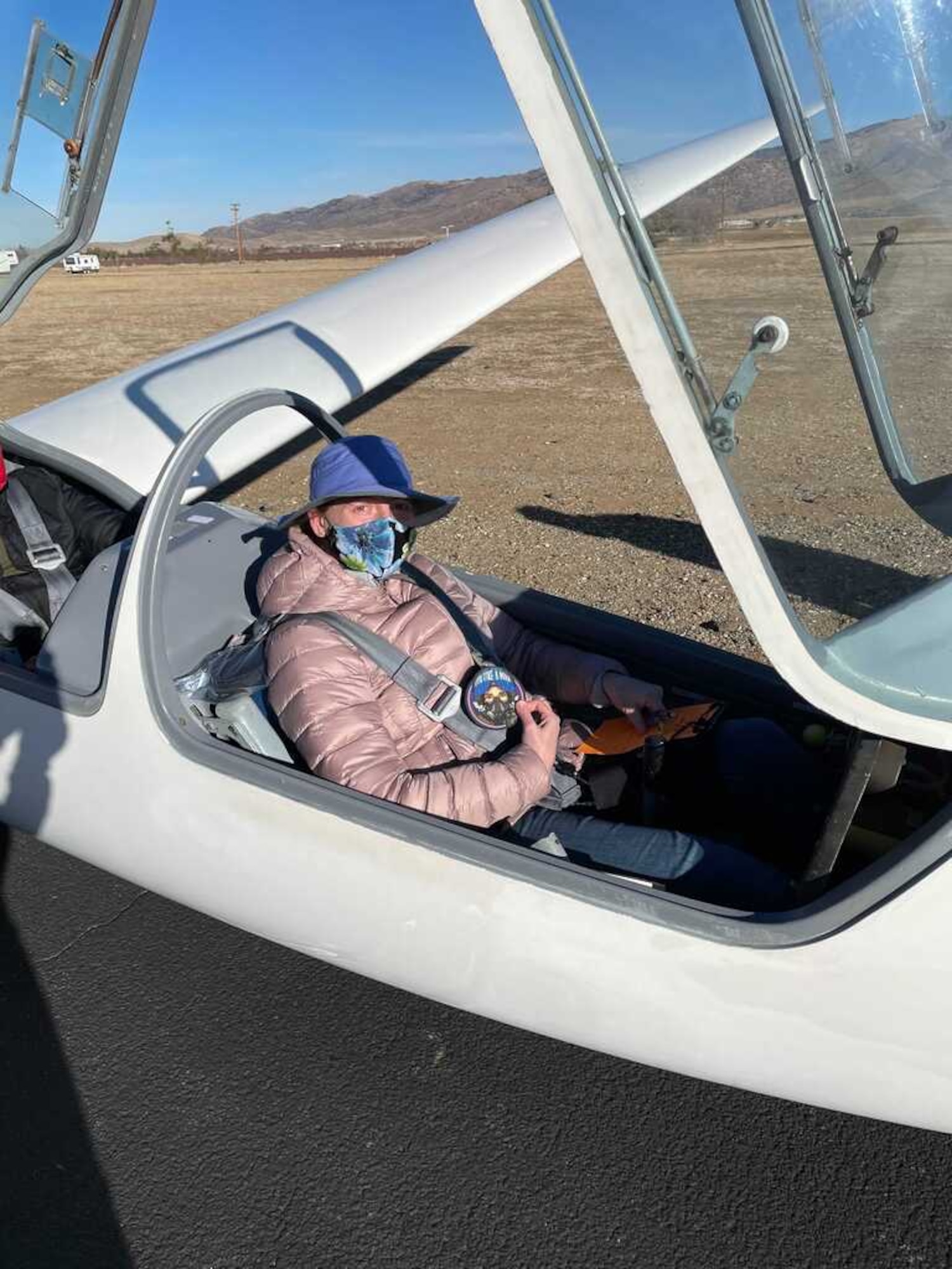 Air Force Research Laboratory Space Test Fundamentals course graduate Evelyn Kent gets ready for one of her course highlights – a glider ride. Kent is a member of the small cadre that graduated from the first STF course, which was held at the U.S. Air Force’s Test Pilot School at Edwards AFB, California. She is taking along the “Fly Like a Girl” patch to be given to girls in Science, Technology, Engineering, and Math (STEM). (Courtesy photo)