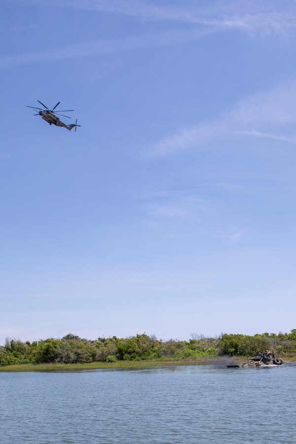 U.S. Marines with Bravo Company, 2d Light Armored Reconnaissance Battalion (2d LAR), 2d Marine Division, participate in a water crossing training event with LAV-25s on Camp Lejeune, N.C., May 17, 2021.