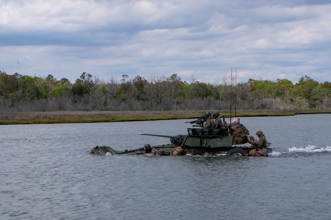 U.S. Marines with Bravo Company, 2d Light Armored Reconnaissance Battalion (2d LAR), 2d Marine Division, participate in a water crossing training event with LAV-25s on Camp Lejeune, N.C., May 17, 2021.