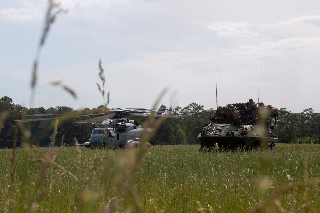 A U.S. Marine Corps CH-53E Super Stallion extracts Marines with Bravo Company, 2d Light Armored Reconnaissance Battalion, 2d Marine Division, during the company's Marine Corps Combat Readiness Evaluation (MCCRE) on Camp Lejeune, N.C., May 17, 2021.