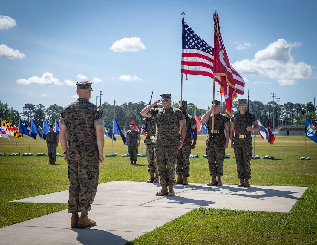 U.S. Marines with 3rd Battalion, 8th Marine Regiment, 2d Marine Division, prepare to case the colors during the battalion's deactivation ceremony on Camp Lejeune, N.C., May 18, 2021.