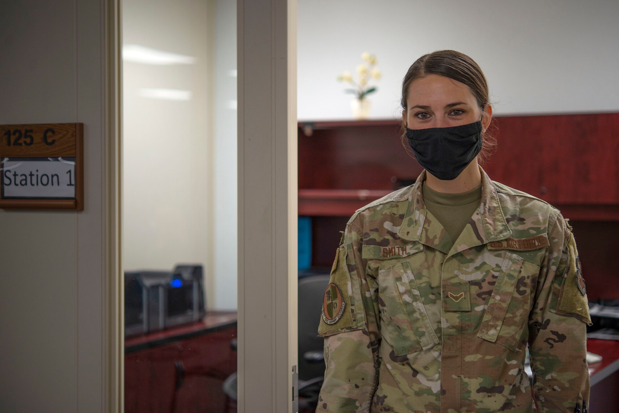 Airman 1st Class Jina Smith, 81st Force Support Squadron customer support apprentice, poses for a photo inside the Sablich Center at Keesler Air Force Base, Mississippi, May 19, 2020. Smith went through basic military training during the height of the COVID-19 pandemic. (U.S. Air Force photo by Senior Airman Kimberly L. Mueller)