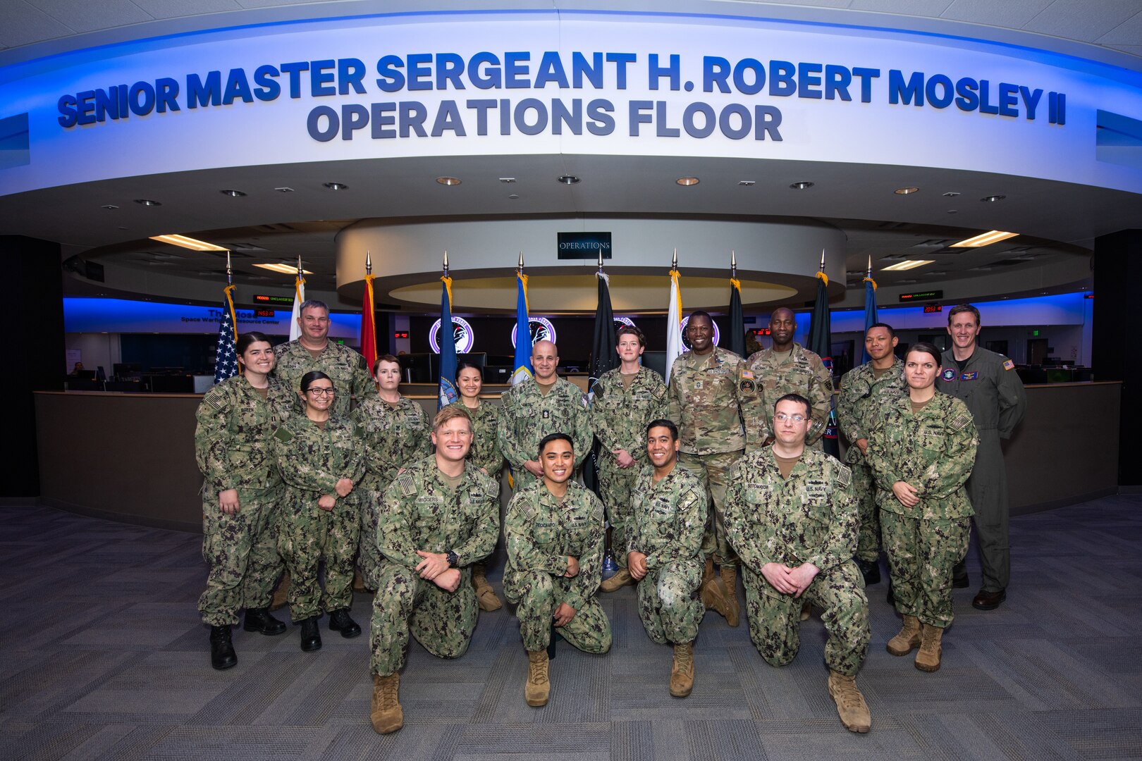 Navy members pose for a group photo