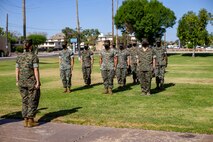 U.S. Marine Corps Cpl. Skylar Jacobson, an administration specialist with Headquarters and Headquarters Squadron (H&HS), re-enlists during a ceremony aboard Marine Corps Air Station Yuma on May 14, 2021. This is Cpl Jacobson's first reenlistment into the Marine Corps. (U.S. Marine Corps photo by Lance Cpl Gabrielle Sanders)