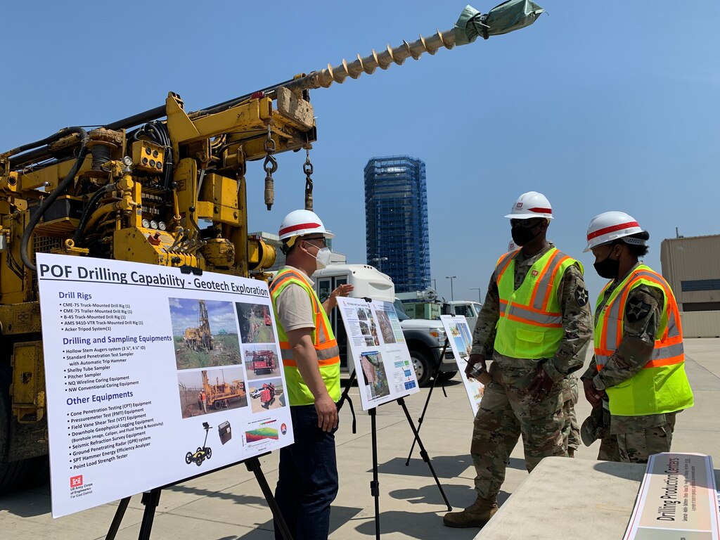 Far East District project site personnel give 11th Engineer Battalion Soldiers a tour of the USAG Humphreys construction site, AFH100, during a visit, May 13