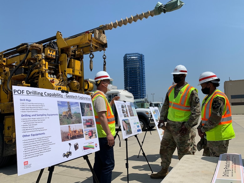 Far East District project site personnel give 11th Engineer Battalion Soldiers a tour of the USAG Humphreys construction site, AFH100, during a visit, May 13