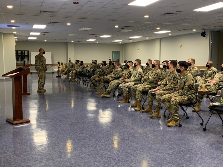 Far East District project site personnel give 11th Engineer Battalion Soldiers a tour of the USAG Humphreys construction site, AFH100, during a visit, May 13