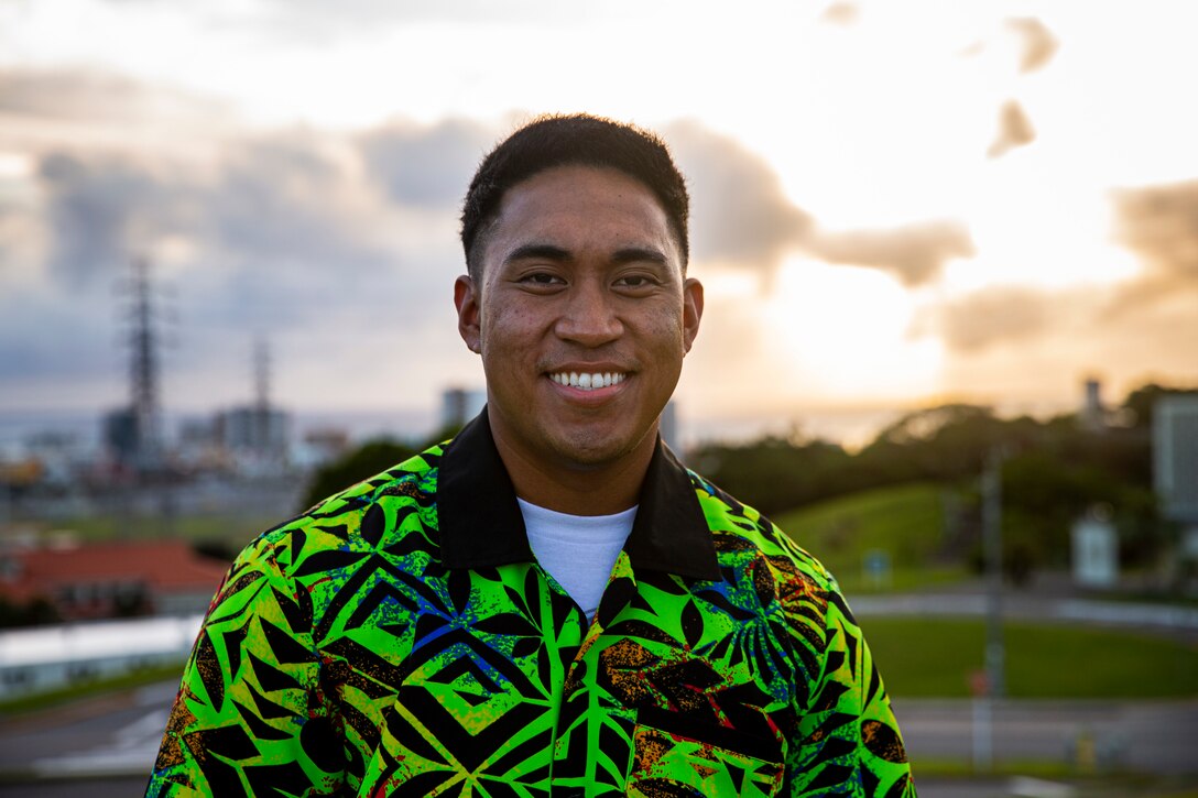 U.S. Marine Corps Cpl. Michael Auvaa, the inbound personnel first-stage noncommissioned officer-in-charge at the Installation Personnel Administration Center (IPAC), poses for an environmental portrait at the IPAC on Camp Foster, Okinawa, Japan, May 18, 2021. Auvaa grew up in A’asu, a village on the north coast of Tutuila Island, American Samoa, and moved to Anchorage, Alaska when he was 16 years-old, and became a Marine two years later in 2018. (U.S. Marine Corps photo by Lance Cpl. Alex Fairchild)