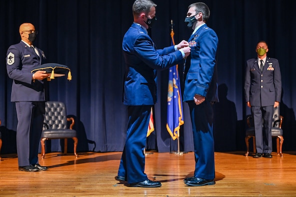 Airmen receiving an award