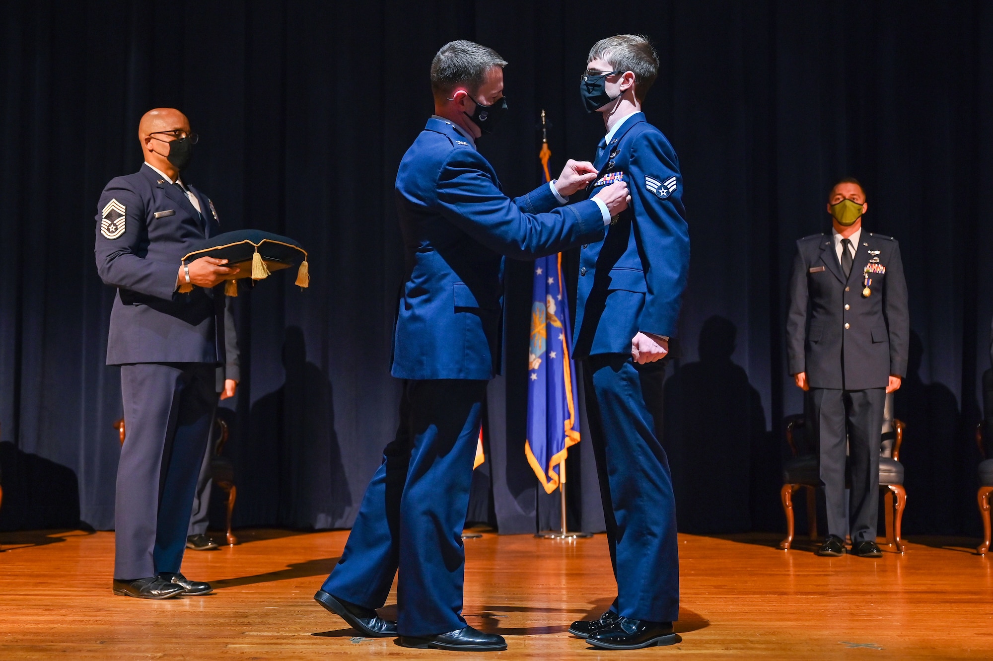Airmen receiving an award