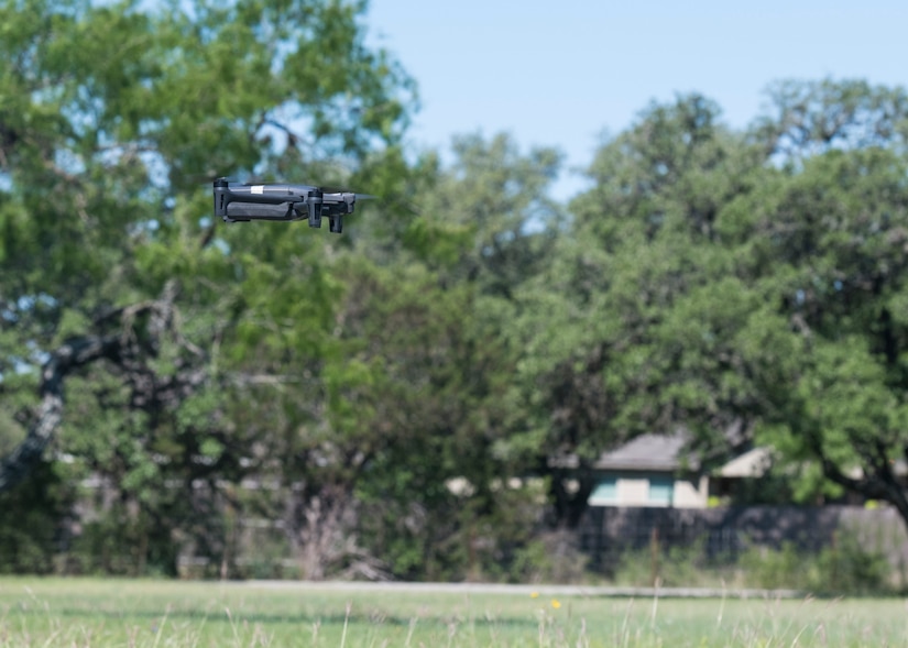 A drone takes flight as members of the Air Force Civil Engineer Center GeoBase program go through drone training at San Geronimo Air Park, Texas, May 7, 2021. The training focused on pre and post-flight checks, projecting flight patterns and 3D mapping using images from the drone. The Air Force GeoBase mission is to create and exploit geospatial information and services to optimize agile combat support and minimize operational risk.