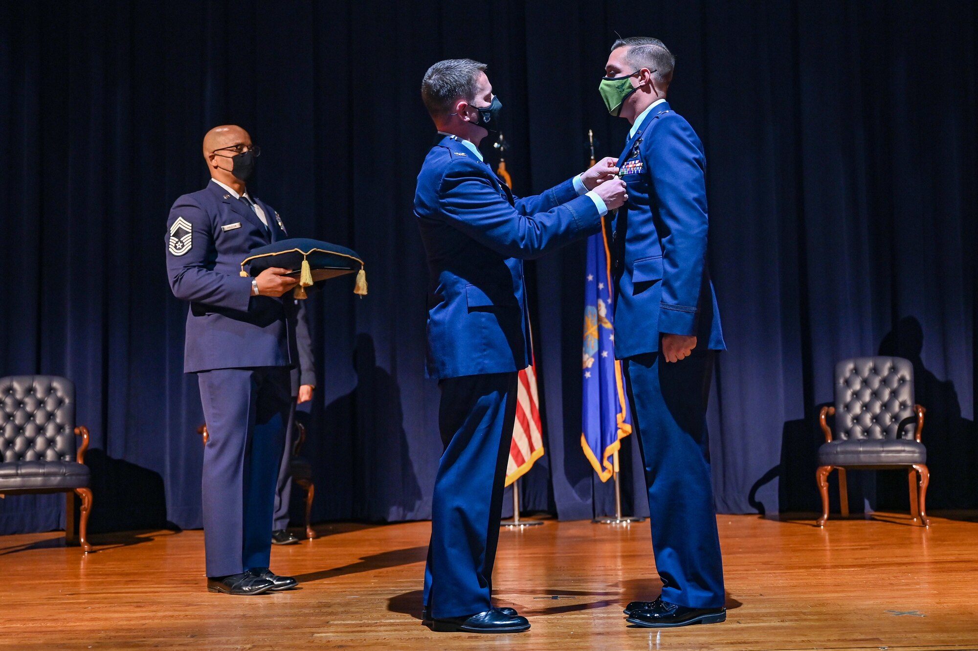 Airmen receiving an award