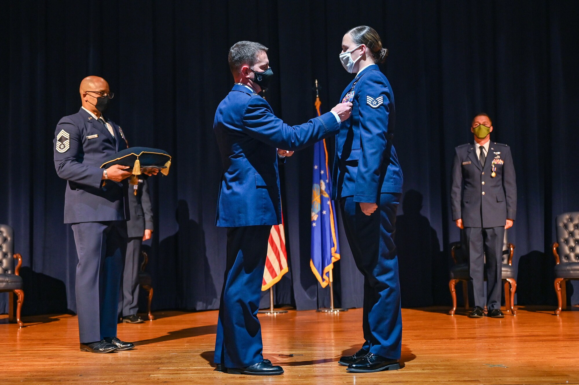 Airmen receiving an award