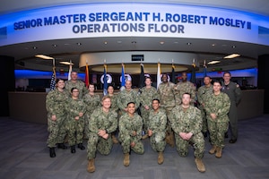 Navy members pose for a group photo