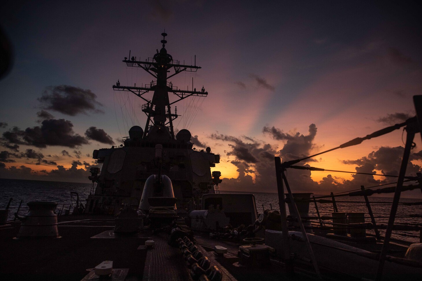 SOUTH CHINA SEA (May 20, 2021) –The Arleigh Burke-class guided-missile destroyer USS Curtis Wilbur (DDG 54) conducts routine operations in the South China Sea. Curtis Wilbur is assigned to Commander, Task Force 71/Destroyer Squadron (DESRON) 15, the Navy’s largest forward DESRON and the U.S. 7th Fleet’s principal surface force.