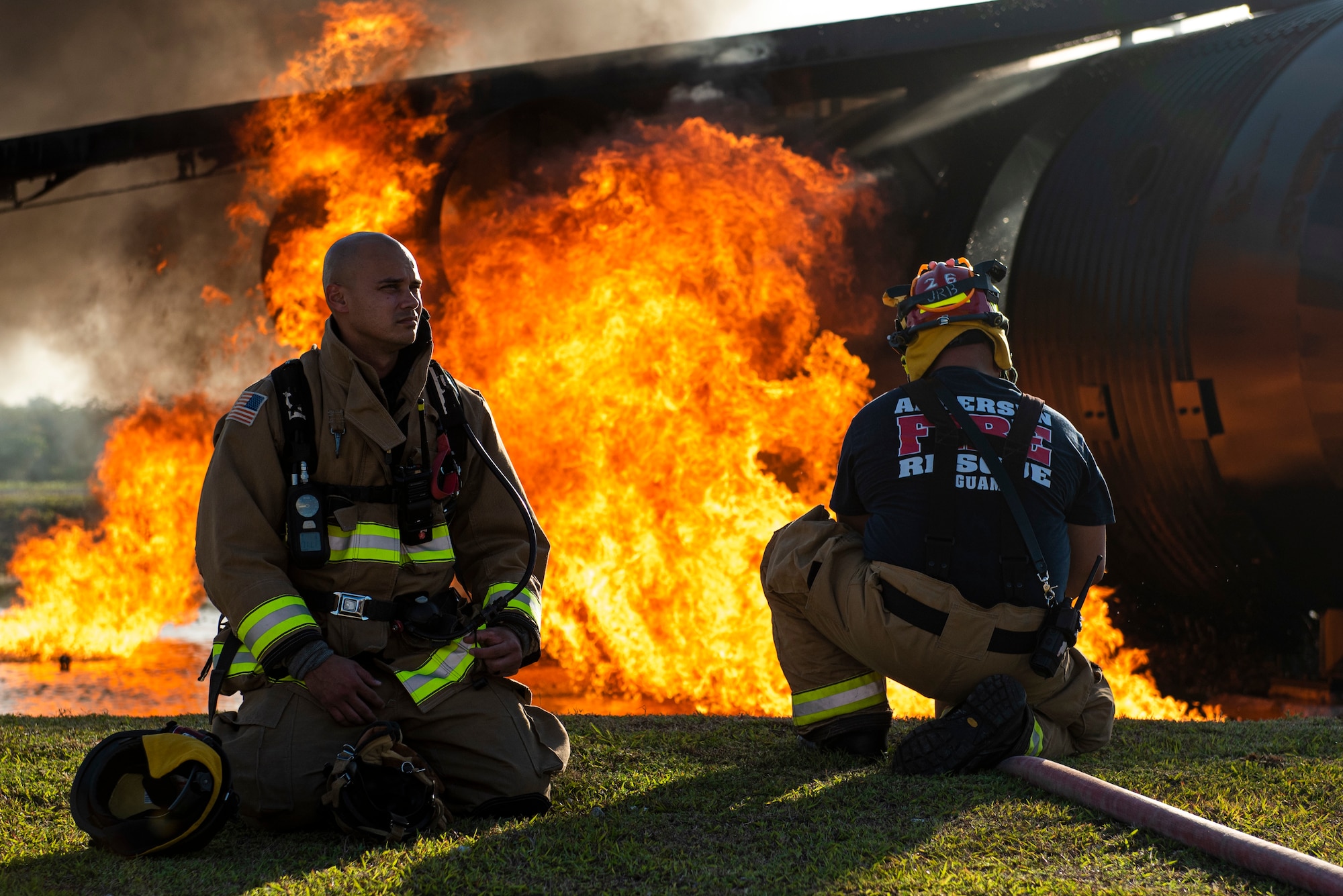 U.S. Air Force firefighters assigned to the 36th Civil Engineer Squadron, prepares to distinguish a fire during joint aircraft fire training at Andersen Air Force Base, Guam, May 11, 2021.