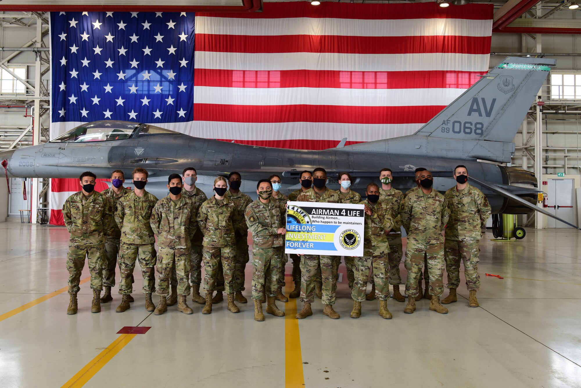 U.S. Air Force Chief Master Sgt. Phillip Easton, U.S. European Command senior enlisted leader, speaks to Airmen from the 31st Maintenance Squadron to talk about the “Airmen 4 Life” program at Aviano Air Base, Italy, May 13, 2021.  During his visit to the base Easton spoke with Airmen about the “Airmen 4 Life” program and how beneficial it is for their daily lives. (U.S. Air Force photo by Senior Airman Jessica Blair)