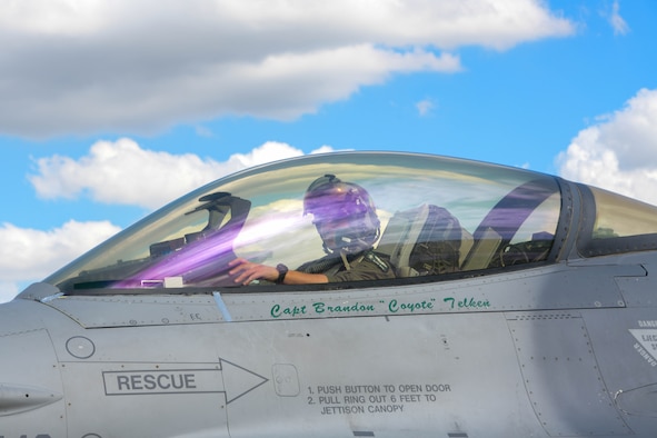 U.S. Air Force Capt. Russell Main, 555th Fighter Squadron F-16 Fighting Falcon pilot, sits in an F-16 after flying in Astral Knight 2021 (AK21) at Aviano Air Base, Italy, May 18, 2021. AK21 involves approximately 1900 combined joint force members from the Albanian, Croatian, Hellenic, Italian and Slovenian militaries. The participating aircraft include the U.S. Air Force F-15E Strike Eagle, F-16, HH-60 Pave Hawk and C-130J Super Hercules aircraft, Italian air force F-35 Lightning II aircraft, Hellenic air force F-16 and Emb-145 Erieye aircraft, and Croatian air force MiG-21 BisD/UMD aircraft. (U.S. Air Force photo by Airman 1st Class Brooke Moeder)