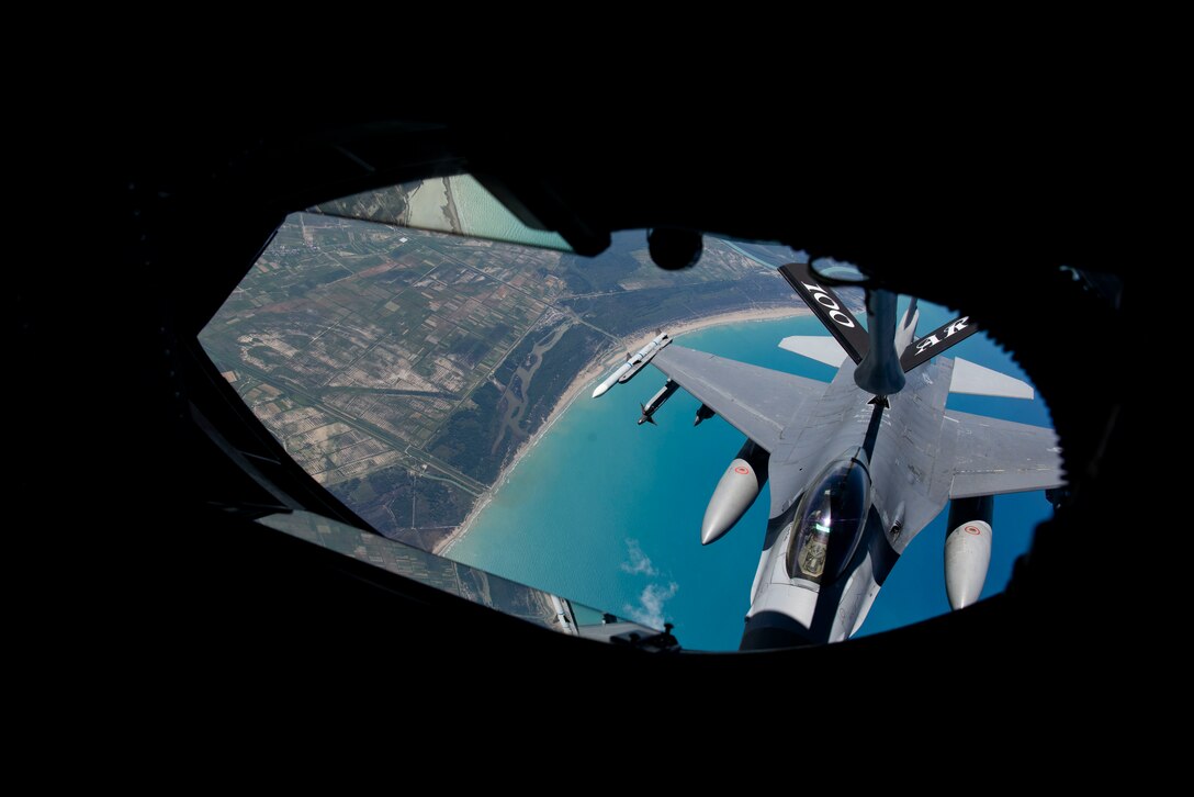 A U.S. Air Force KC-135 Stratotanker assigned to the 100th Air Refueling Wing refuels a U.S. Air Force F-16C Fighting Falcon during exercise Astral Knight 21 over the Adriatic Sea, May 18, 2021.