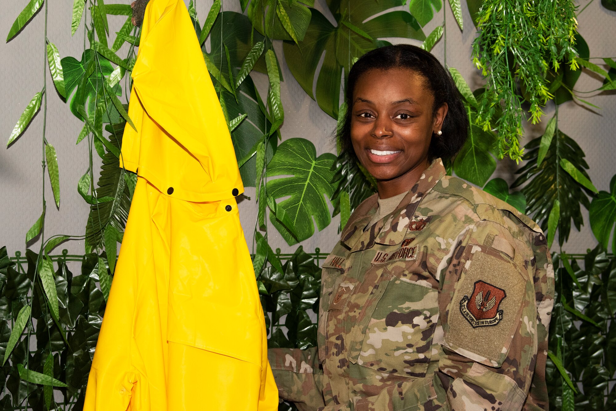 U.S. Air Force Master Sgt. Chemiese Hall, 52nd Fighter Wing superintendent of religious affairs and chapel operations, poses for a picture in an escape room May 14, 2021, at Spangdahlem Air Base, Germany. Hall was one of the chief designers and master builders of the base’s two escape rooms set to open in May of 2021. (U.S. Air Force photo by Tech. Sgt. Tony Plyler)