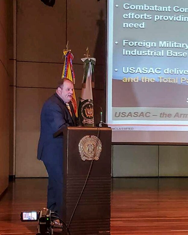Jason King, the Country Program Manager, from Army Security Assistance Command, briefs the audience during a training class at the Colombian National Police headquarters, in Bogota, Colombia.