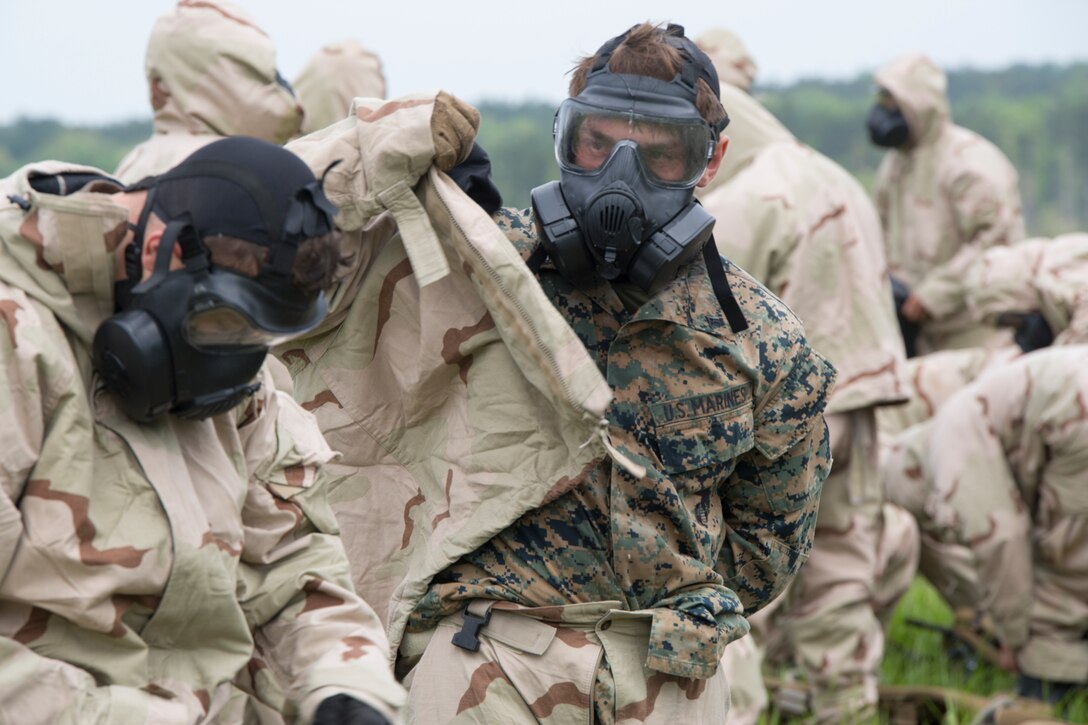 Marines prepare for a CBRN environment during the 1st Annual MCSFR Squad Competition