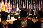 college students at a ceremony