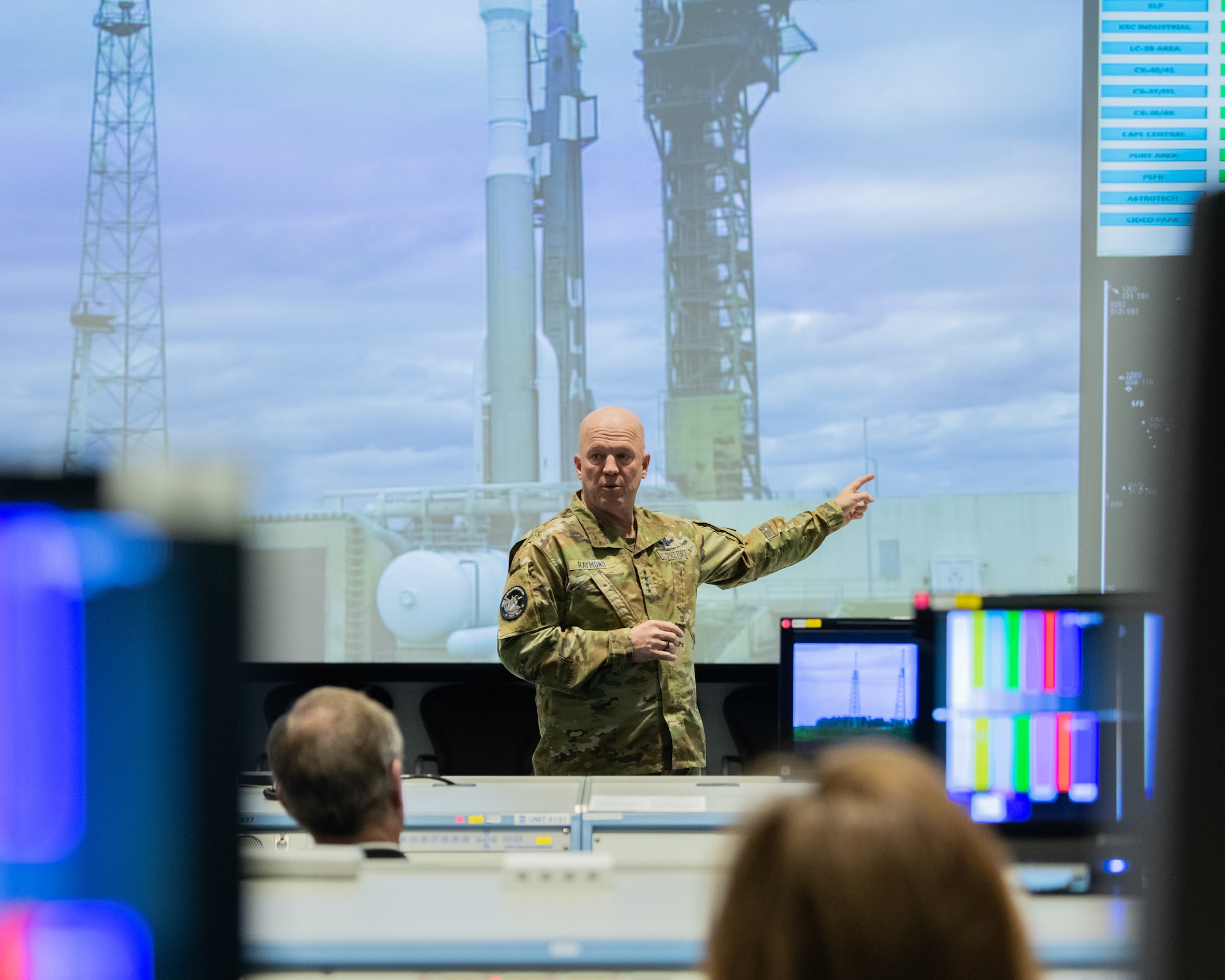 U.S. Space Force Gen. John W. "Jay" Raymond, Chief of Space Operations, speaks to the group about space operations in the Morrell Operations Center at Cape Canaveral Space Force Station, Fla., May 17, 2021. During his visit, he also toured the Spaceflight Operations Processing Center. (U.S. Space Force photo by Airman 1st Class Dakota Raub)