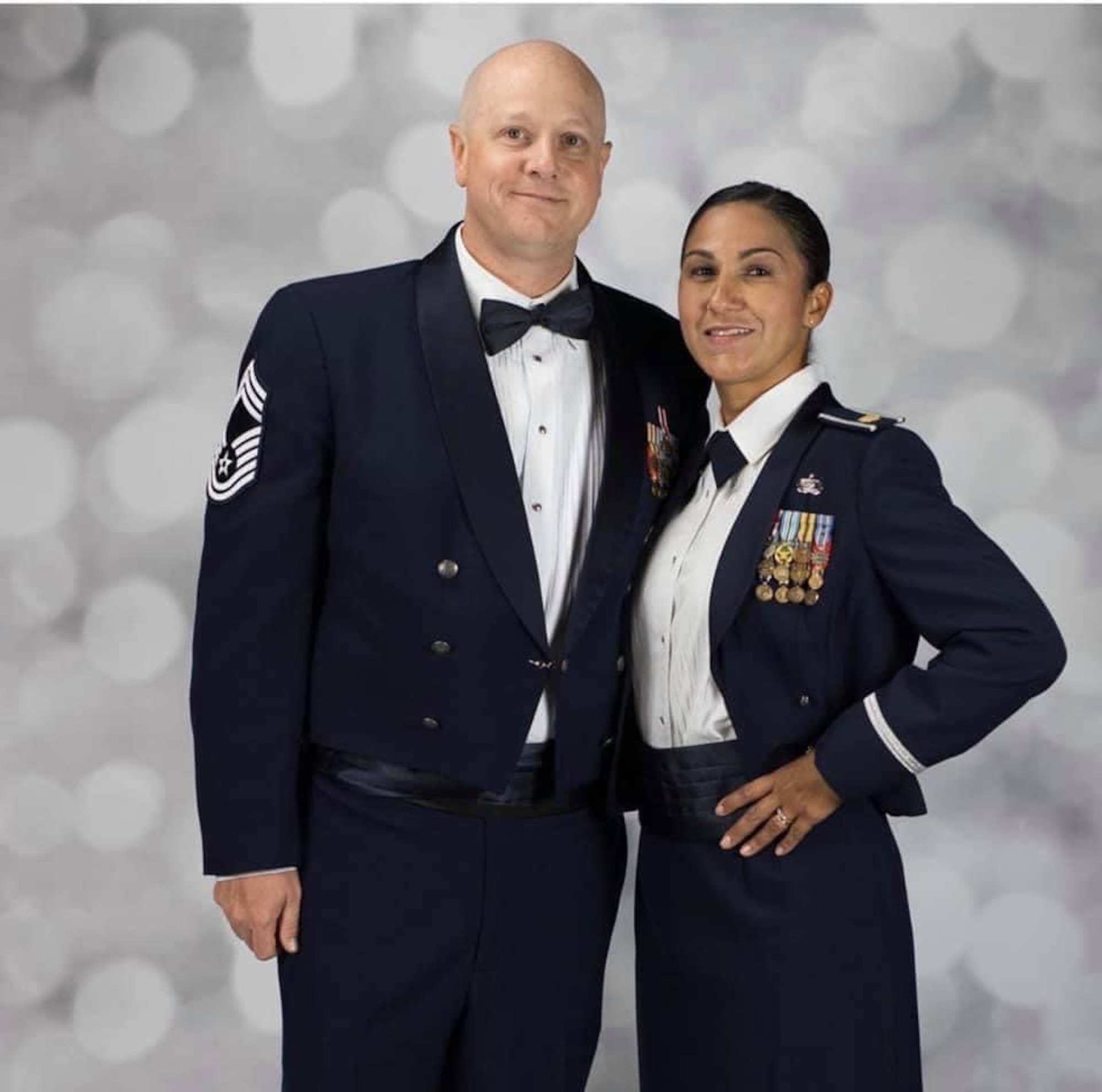 Chief Master Sgt. Michael Johnson, Air Force Recruiting Service chief of strategic marketing, poses with his wife, Lt. Col. Emilia Johnson, Air Force Personnel Center assignment program development chief, at the Air Force Ball in 2019.