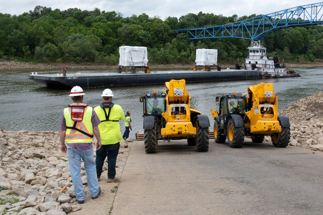 The Motor Vessel John Wepfer delivers two 90-ton transformers May 18, 2021 to the Barkley Dam Powerplant on the Cumberland River in Kuttawa, Kentucky. The U.S. Army Corps of Engineers Nashville District is replacing the transformers in the switchyard that have been in service since 1971. (USACE Photo by Lee Roberts)