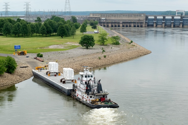 The Motor Vessel John Wepfer delivers two 90-ton transformers May 18, 2021 to the Barkley Dam Powerplant on the Cumberland River in Kuttawa, Kentucky. The U.S. Army Corps of Engineers Nashville District is replacing the transformers in the switchyard that have been in service since 1971. (USACE Photo by Lee Roberts)