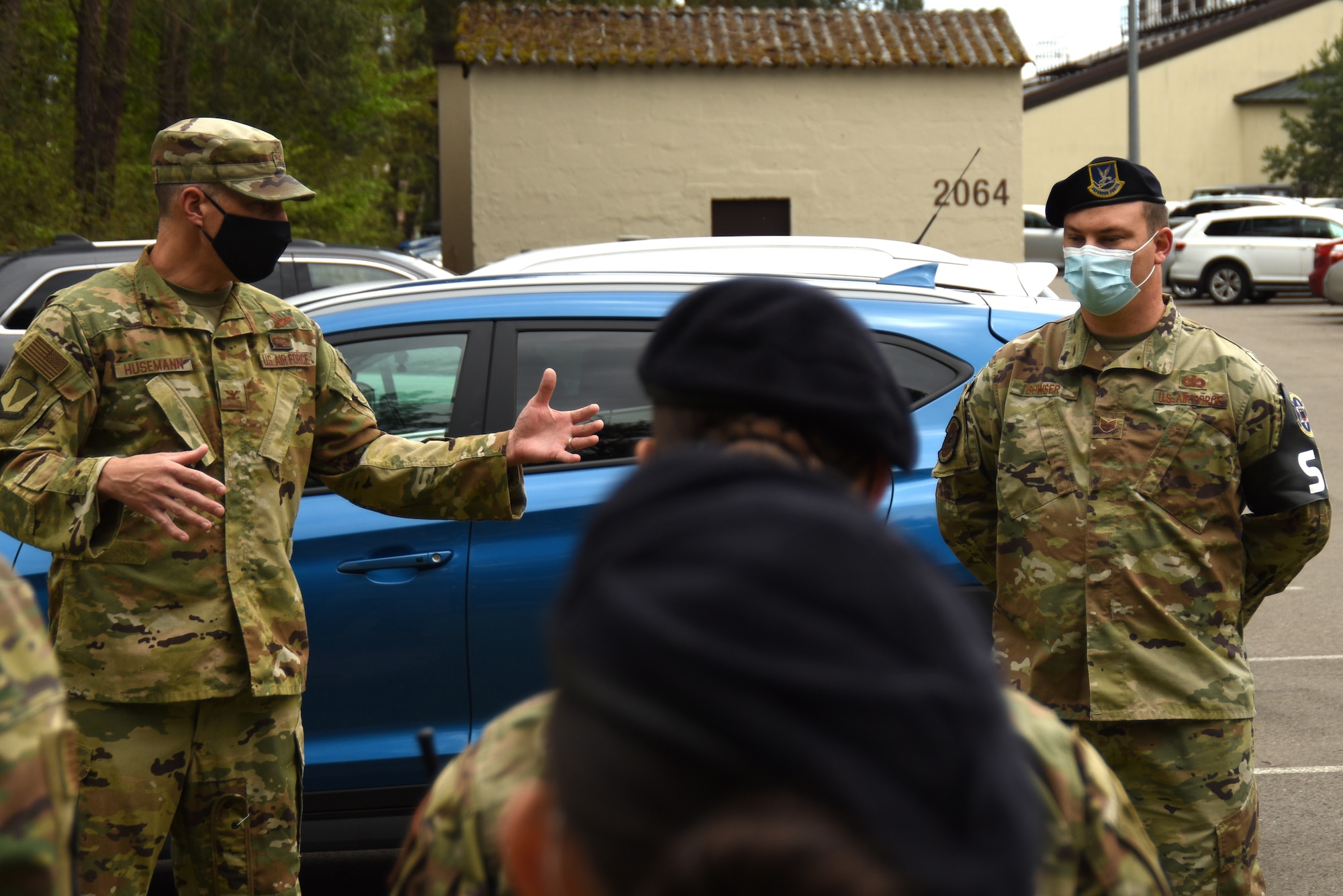 U.S. Air Force Col. Matthew Husemann, 86th Airlift Wing vice commander, left, presents Tech. Sgt. Edwin Bowser, 569th U.S. Forces Police Squadron flight sergeant, as the Airlifter of the Week at Kapaun Air Station, Germany, May 12, 2021.