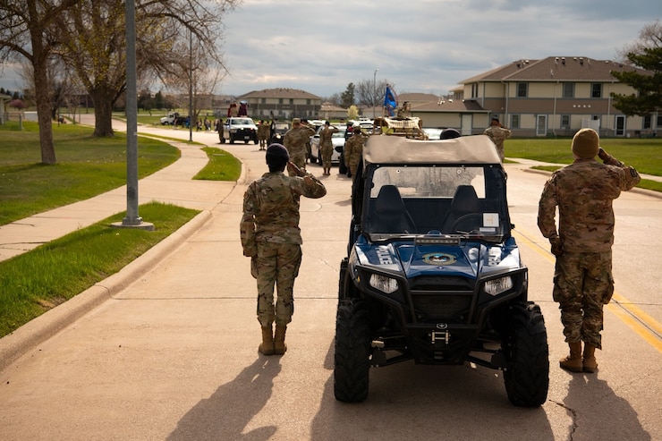 Defenders of the 28th Security Forces Squadron paused the National Police Week parade to stand for the national anthem at Ellsworth Air Force Base, S.D., May 10, 2021.