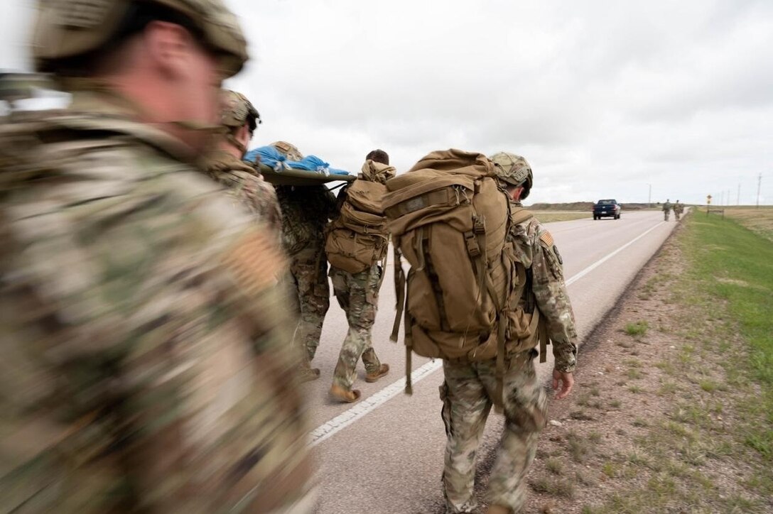 Airmen from the 28th Security Forces Squadron participated in a 6.4K ruck march at Ellsworth Air Force Base, S.D., May 10, 2021.