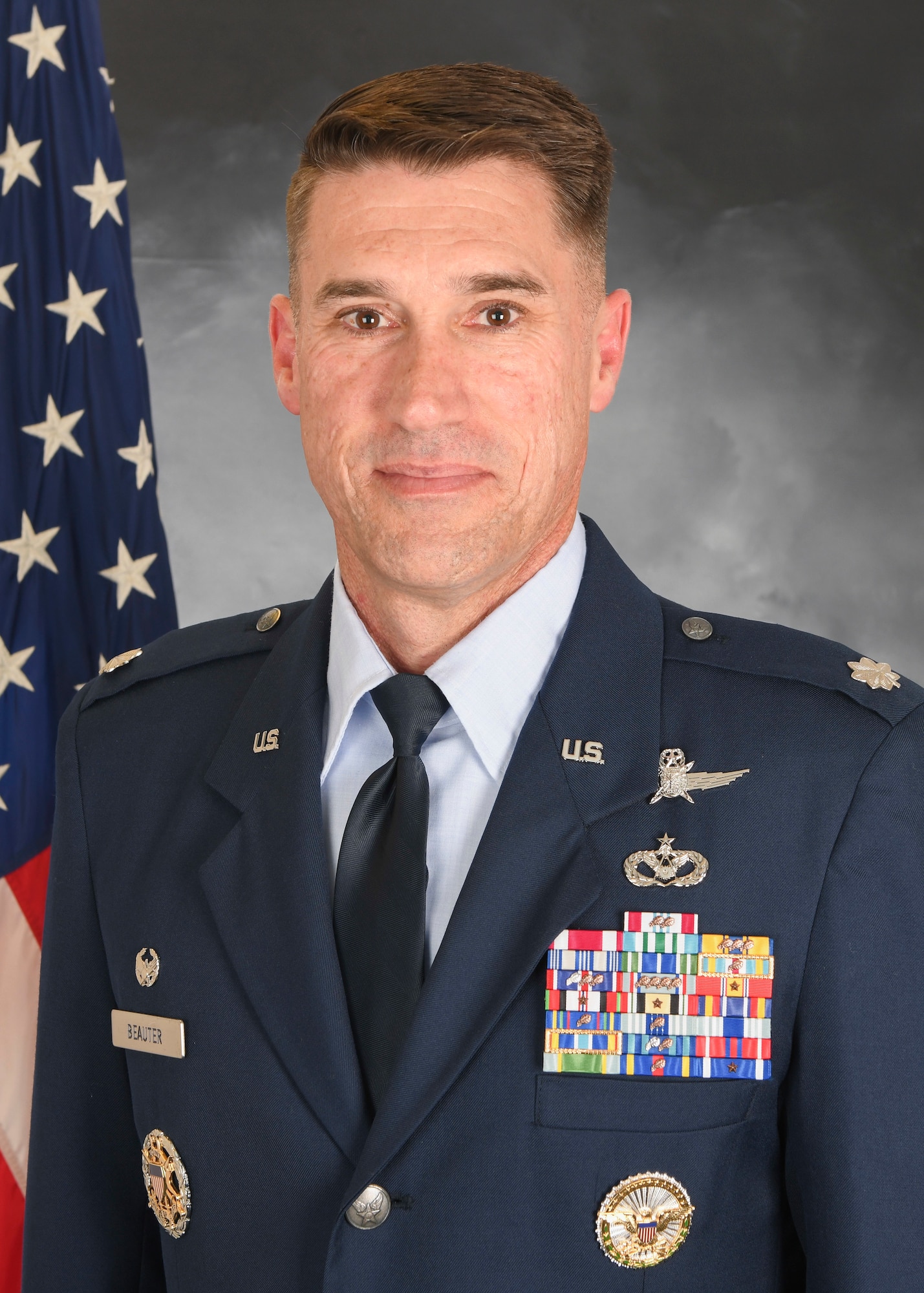 U.S. Air Force Lt. Col. Brian Beauter, 423rd Communications Squadron commander, poses for a studio photo at Royal Air Force Alconbury, England, July 11, 2019. (U.S. Air Force photo by Senior Airman Chase Sousa)