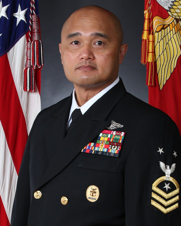 Command Master Chief Rebana, enlisted in the United States Navy in April 1994 from San Diego, CA.  Following completion of basic training at Recruit Training Command Great Lakes, IL he reported to Hospital Corpsman “A” School in Great Lakes, IL.
 
Sea duty assignments include 3d Battalion 7th Marines 29 Palms, CA; 3d Battalion 6th Marines, 6th Marine Regiment, and Headquarters Battalion, 2d Marine Division Camp Lejeune, NC; 3d Medical Battalion Okinawa, Japan; 2d Marine Logistics Group Camp Lejeune, NC.
 
Shore assignments include Naval Hospital Jacksonville, FL; Recruit Training Command Great Lakes, IL; Naval Hospital Camp Lejeune, NC; Naval Hospital Camp Pendleton, CA.
 
Operational deployments include Okinawa, Japan under the Unit Deployment Program (UDP); 3d Battalion 6th Marines, Al Qaim, Iraq in support of Operation Iraqi Freedom (OIF) III; 3d Battalion 6th Marines, Habbaniyah, Iraq in support of OIF 06-08; Regimental Combat Team-6, Ramadi, Iraq in support of OIF 09.1.  

Command Master Chief Rebana is a graduate of the Navy Senior Enlisted Academy Class 161, Command Master Chief/Chief of the Boat Course Class 132, Keystone Course, and is Enlisted Fleet Marine Force Warfare qualified.  He has served in various leadership billets and as the Command Master Chief of 3d Medical Battalion, 2d Marine Logistics Group, and 2d Marine Division.  
 
His decorations include the Legion of Merit, Meritorious Service Medal (4 awards), Navy and Marine Corps Commendation Medal (3 awards), Navy and Marine Corps Achievement Medal (4 awards), Combat Action Ribbon, and various unit awards.