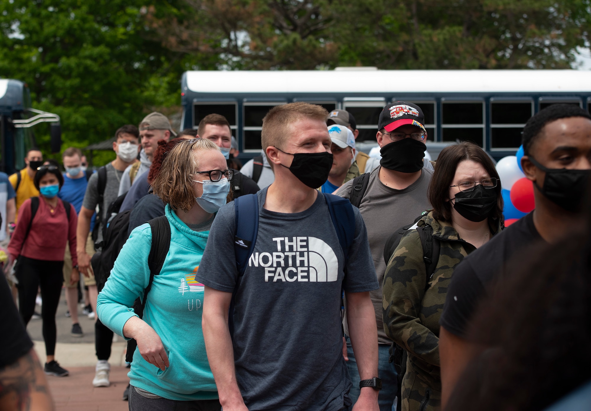 U.S. Air Force Airmen with the 88th MedicalGroup arrive home at Wright-Patterson Air Force Base, Ohio, May 18, 2021, following a two-month long deployment to Detroit. The Airmen helped administer more than 200,000doses of the COVID-19 vaccine to Michigan residents. (U.S. Air Force photo by R.J. Oriez)
