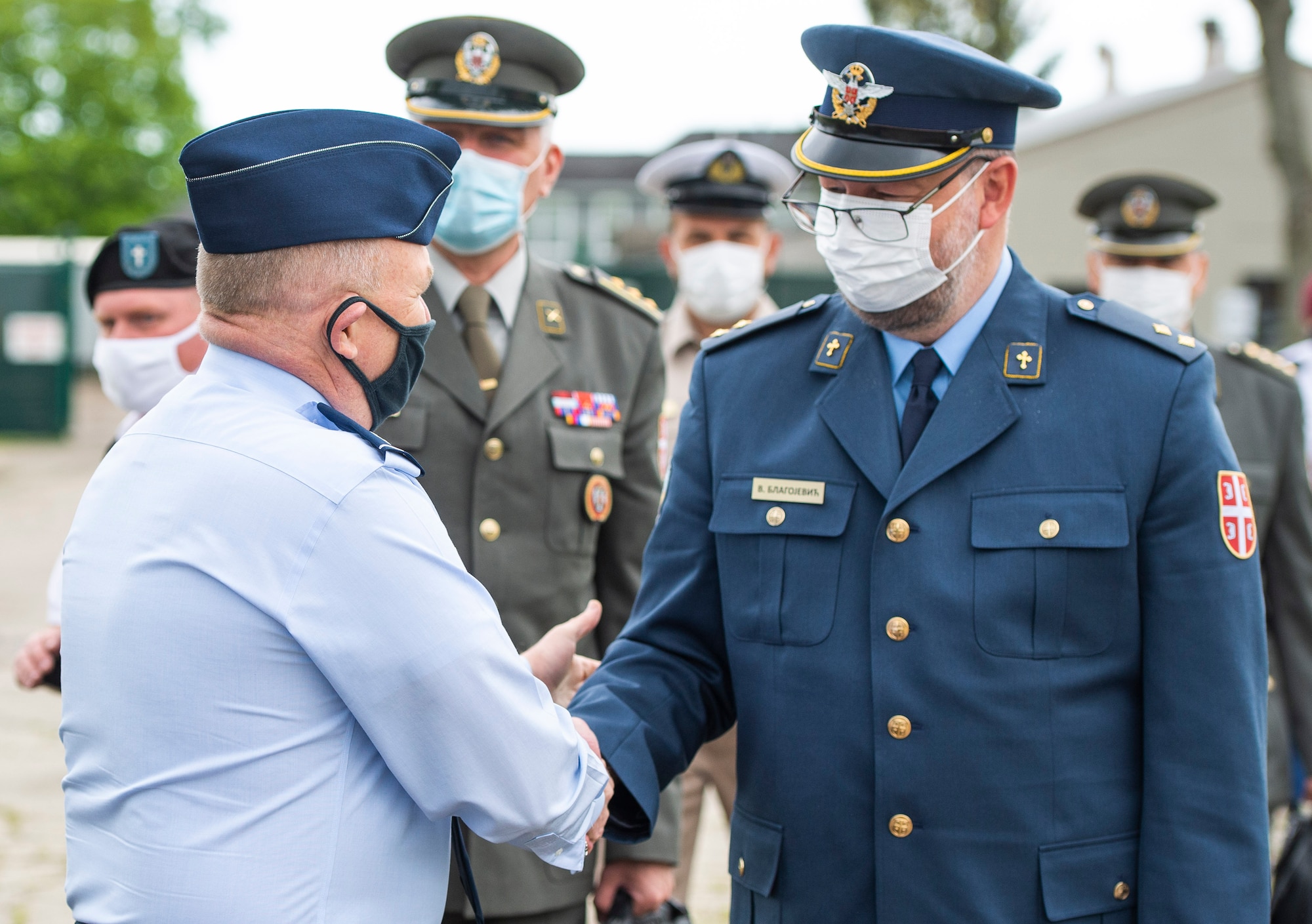 Lt. Vladimir Blagojevic, Serbian Air Force orthodox chaplain, is greeted by Col. Kim Bowen, 88th Air Base Wing chaplain, upon his arrival to the Prairies Chapel at Wright-Patterson Air Force Base, Ohio, May 11, 2021. The Serbian chaplains visited the base with U.S. Army Col. Daniel Burris, chaplain for the Ohio National Guard’s Special Troops Command, as part of the National Guard's State Partnership Program. (U.S. Air Force photo by Wesley Farnsworth)