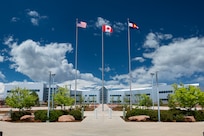 Photo illustration of the North American Aerospace Defense Command and U.S. Northern Command Headquarters building on Peterson Air Force Base, Colorado