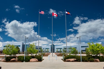 Photo illustration of the North American Aerospace Defense Command and U.S. Northern Command Headquarters building on Peterson Air Force Base, Colorado