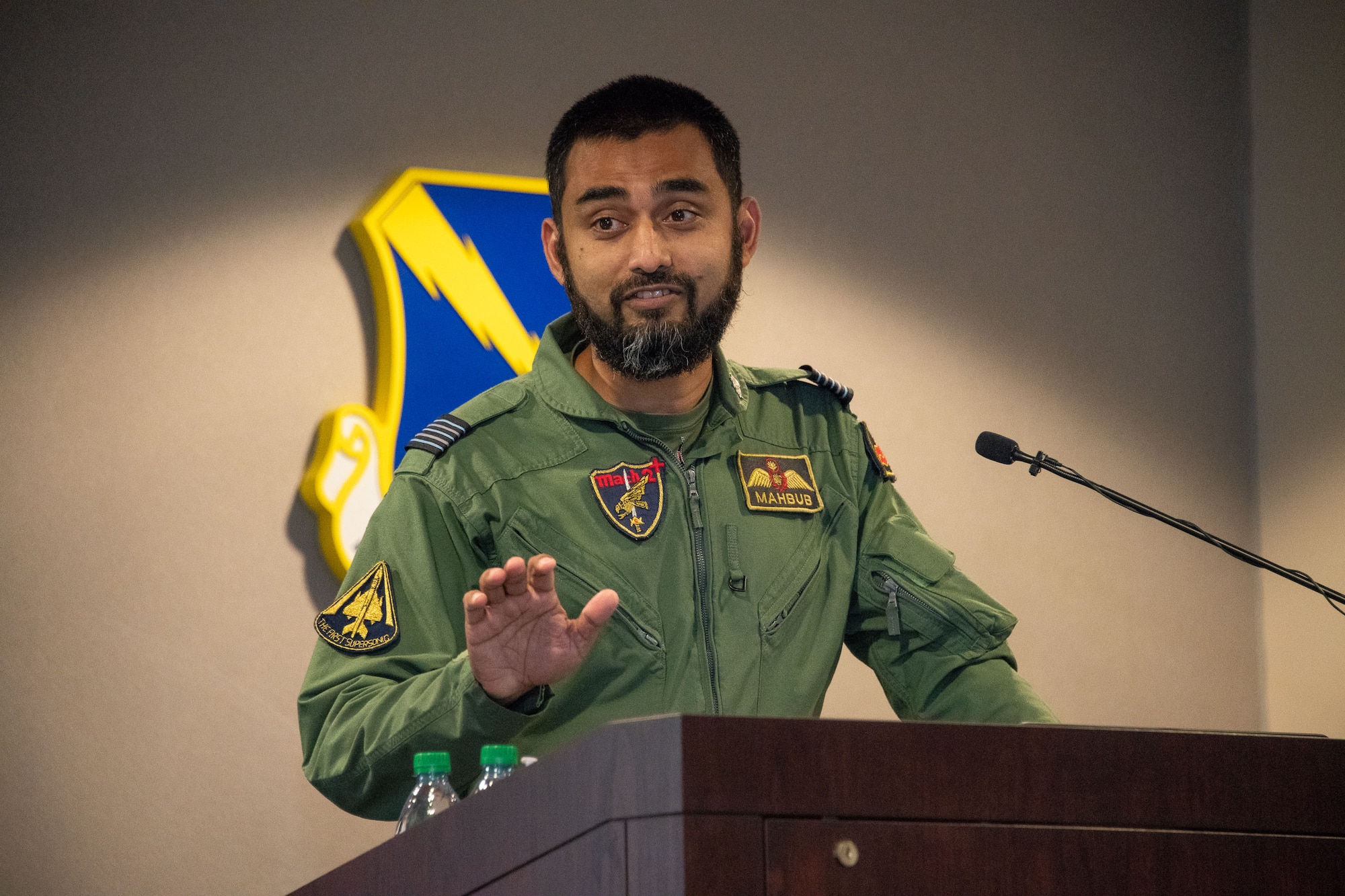Air Command and Staff College International Officer Class President, Wing Commander Mahbub Ur Rahman from Bangladesh speaks to Alabama Goodwill Ambassador Appreciation event attendees at Husband Auditorium, Maxwell Air Force Base, Alabama, 18, 2021.