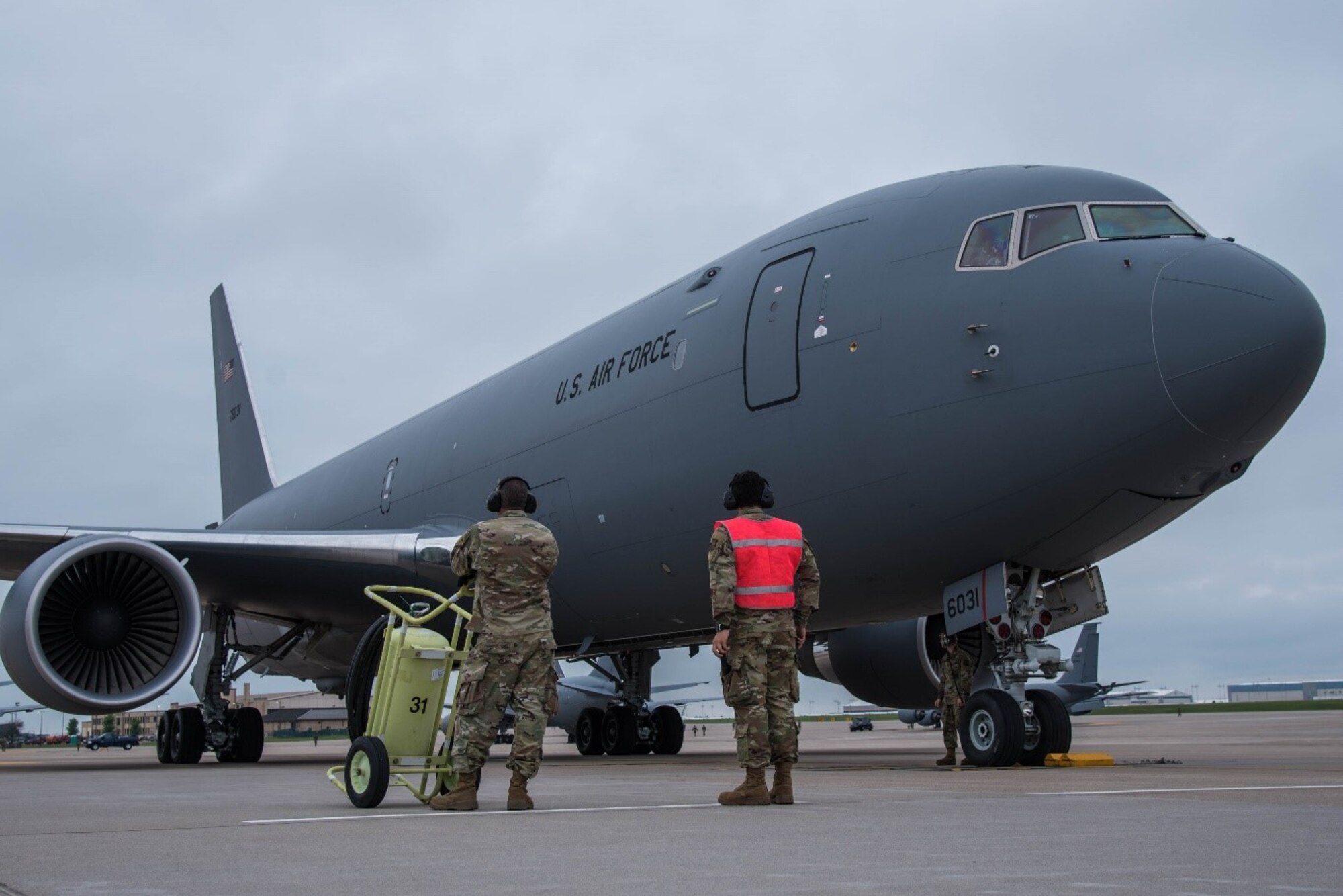 Maintenance professionals conduct a preflight inspection and prepare a KC-46A Pegasus for a mission to refuel a B-1B Lancer May 17, 2021, at McConnell Air Force Base, Kan.