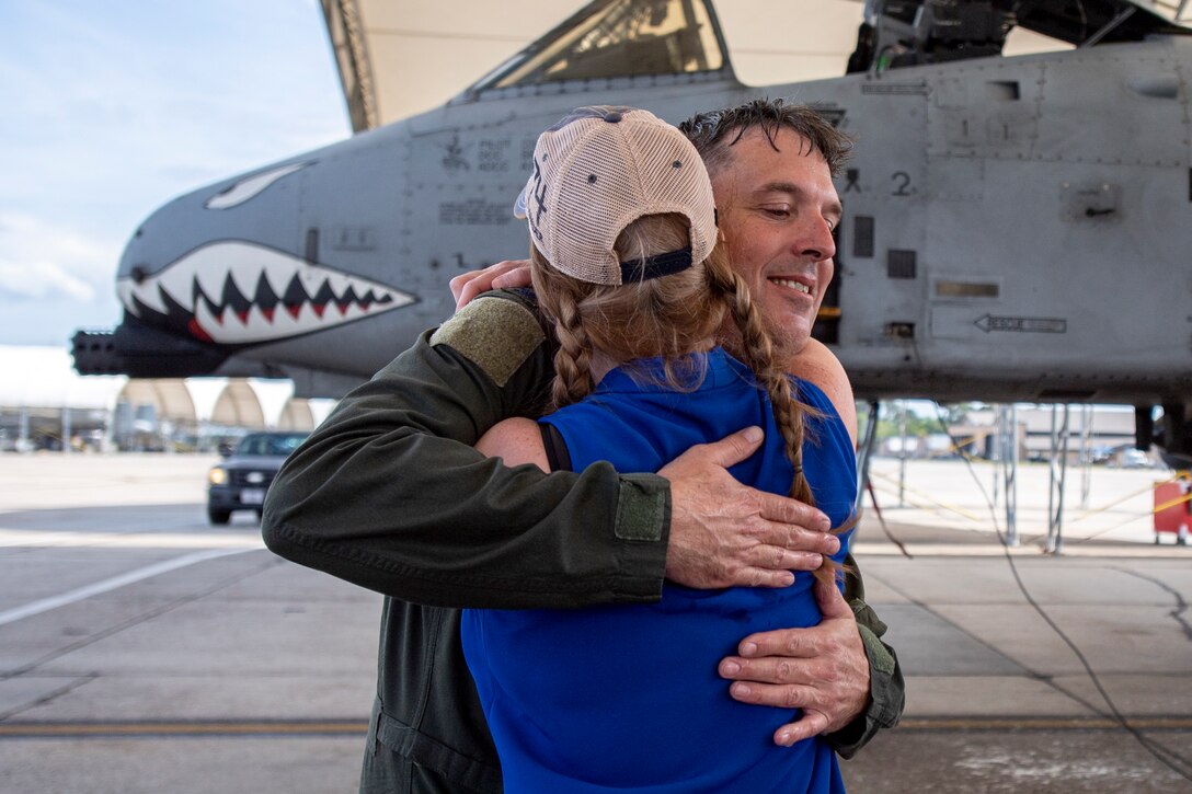 photo of two people hugging