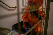 Tech Sgt. Eric McComb, 103rd Civil Support Team, responds to a simulated incident at a parking garage on the University of Alaska Anchorage campus May 18 in support of Exercise ORCA 2021. ORCA is a chemical, biological, radioactive, nuclear threats response exercise designed for participants to provide support in the aftermath of hazardous materials incidents. ORCA tests interoperability between agencies, increases opportunities for working relationships, and practices requests for assistance methods. Approximately 250 National Guardsmen from CST units in Alaska, California, Connecticut, Colorado, Idaho, Ohio, Oregon, Rhode Island, South Carolina, South Dakota, Washington, and Wisconsin are in Alaska to participate in Exercise ORCA 2021. Numerous support units and civilian agencies participated in the exercise as well. (U.S. Army National Guard photo by Spc. Grace Nechanicky)