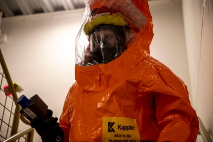 Tech Sgt. Eric McComb, 103rd Civil Support Team, responds to a simulated incident at a parking garage on the University of Alaska Anchorage campus May 18 in support of Exercise ORCA 2021. ORCA is a chemical, biological, radioactive, nuclear threats response exercise designed for participants to provide support in the aftermath of hazardous materials incidents. ORCA tests interoperability between agencies, increases opportunities for working relationships, and practices requests for assistance methods. Approximately 250 National Guardsmen from CST units in Alaska, California, Connecticut, Colorado, Idaho, Ohio, Oregon, Rhode Island, South Carolina, South Dakota, Washington, and Wisconsin are in Alaska to participate in Exercise ORCA 2021. Numerous support units and civilian agencies participated in the exercise as well. (U.S. Army National Guard photo by Spc. Grace Nechanicky)