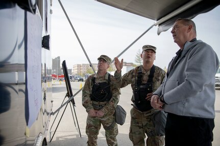 Members of the 103rd Civil Support Team conduct mission briefings before they send personnel into a tower at the Anchorage Fire Training Center to respond to a simulated incident May 19, as part of Exercise ORCA 2021. ORCA is a chemical, biological, radioactive, nuclear threats response exercise designed for participants to provide support in the aftermath of hazardous materials incidents. ORCA tests interoperability between agencies, increases opportunities for working relationships, and practices requests for assistance methods. Approximately 250 National Guardsmen from CST units in Alaska, California, Connecticut, Colorado, Idaho, Ohio, Oregon, Rhode Island, South Carolina, South Dakota, Washington, and Wisconsin are in Alaska to participate in Exercise ORCA 2021. Numerous support units and civilian agencies participated in the exercise as well. (U.S. Army National Guard photo by Spc. Grace Nechanicky)