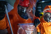 Sgt. Anthony Luiken, 103rd Civil Support Team, and Staff Sgt. Jonathan Ramos, 103rd CST, collect and seal samples at a simulated incident at the Anchorage Fire Training Center, May 19, in support of Exercise ORCA 2021. ORCA is a chemical, biological, radioactive, nuclear threats response exercise designed for participants to provide support in the aftermath of hazardous materials incidents. ORCA tests interoperability between agencies, increases opportunities for working relationships, and practices requests for assistance methods. Approximately 250 National Guardsmen from CST units in Alaska, California, Connecticut, Colorado, Idaho, Ohio, Oregon, Rhode Island, South Carolina, South Dakota, Washington, and Wisconsin are in Alaska to participate in Exercise ORCA 2021. Numerous support units and civilian agencies participated in the exercise as well. (U.S. Army National Guard photo by Spc. Grace Nechanicky)