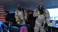 Members of the 13th Civil Support, Rhode Island National Guard, Team relay information back to the team’s command post during their initial survey of the simulated incident site at the Port of Seward Drydocks in Seward, Alaska, May 18, in support of Exercise ORCA 21. ORCA is a chemical, biological, radioactive, nuclear threats response exercise designed for participants to provide support in the aftermath of hazardous materials incidents. ORCA tests interoperability between agencies, increases opportunities for working relationships and practices requests for assistance methods. Approximately 250 National Guardsmen from CST units in Alaska, California, Connecticut, Colorado, Idaho, Ohio, Oregon, Rhode Island, South Carolina, South Dakota, Washington, and Wisconsin are in Alaska to participate in Exercise ORCA 2021. Numerous support units and civilian agencies participated in the exercise as well. (U.S. Army National Guard photo by Dana Rosso)