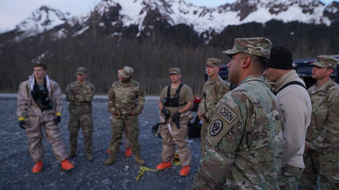 Members of the 13th Civil Support Team, Rhode Island National Guard, conduct the initial entry brief prior to dispatching the survey team into the simulated incident site at the Port of Seward Drydocks in Seward, Alaska, May 18, in support of Exercise ORCA 21. ORCA is a chemical, biological, radioactive, nuclear threats response exercise designed for participants to provide support in the aftermath of hazardous materials incidents. ORCA tests interoperability between agencies, increases opportunities for working relationships, and practices requests for assistance methods. Approximately 250 National Guardsmen from CST units in Alaska, California, Connecticut, Colorado, Idaho, Ohio, Oregon, Rhode Island, South Carolina, South Dakota, Washington, and Wisconsin are in Alaska to participate in Exercise ORCA 2021. Numerous support units and civilian agencies participated in the exercise as well. (U.S. Army National Guard photo by Dana Rosso)